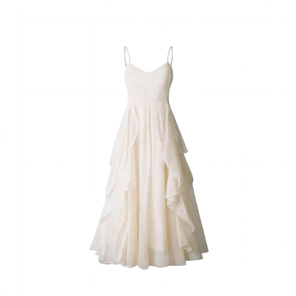 Brown Leather Jacket and White Ruffle Dress Set, close-up of the white ruffle strap maxi dress with flowing layers
