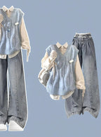 Blue Cable Knit Vest Shirt and Jeans Set, cable knit vest over cream shirt and light-wash wide-leg jeans flat lay