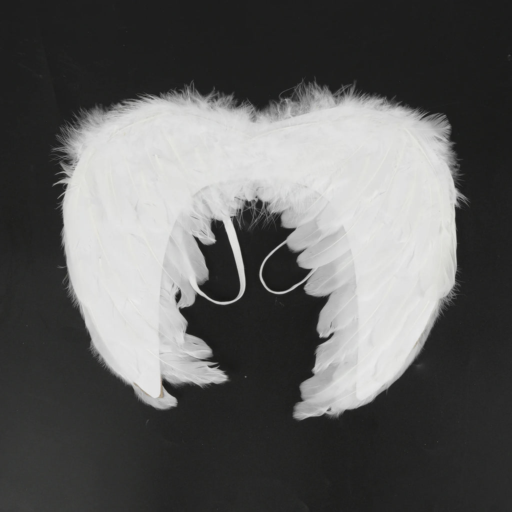 White feather angel wings front view on black background