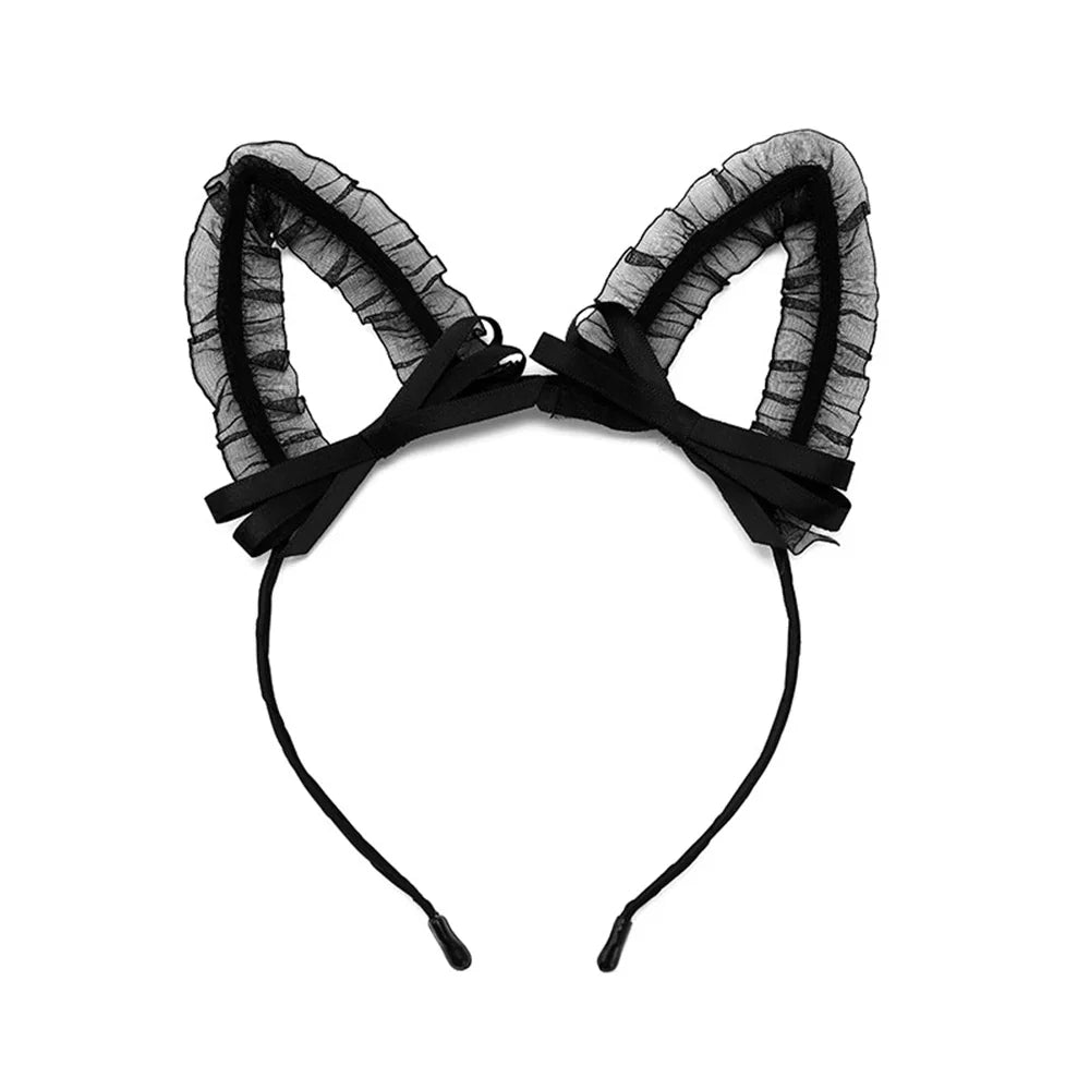 Tall ruffled black mesh bunny ear headband with satin bows, front view