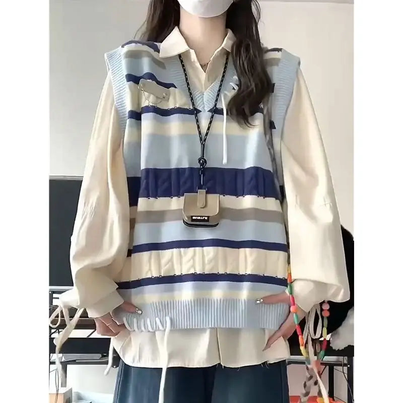 Blue Striped Knit Vest Shirt and Jeans Set, model wearing striped knit vest over cream shirt with small pouch necklace