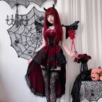 Model wearing burgundy gothic Halloween dress with trident, full body front view