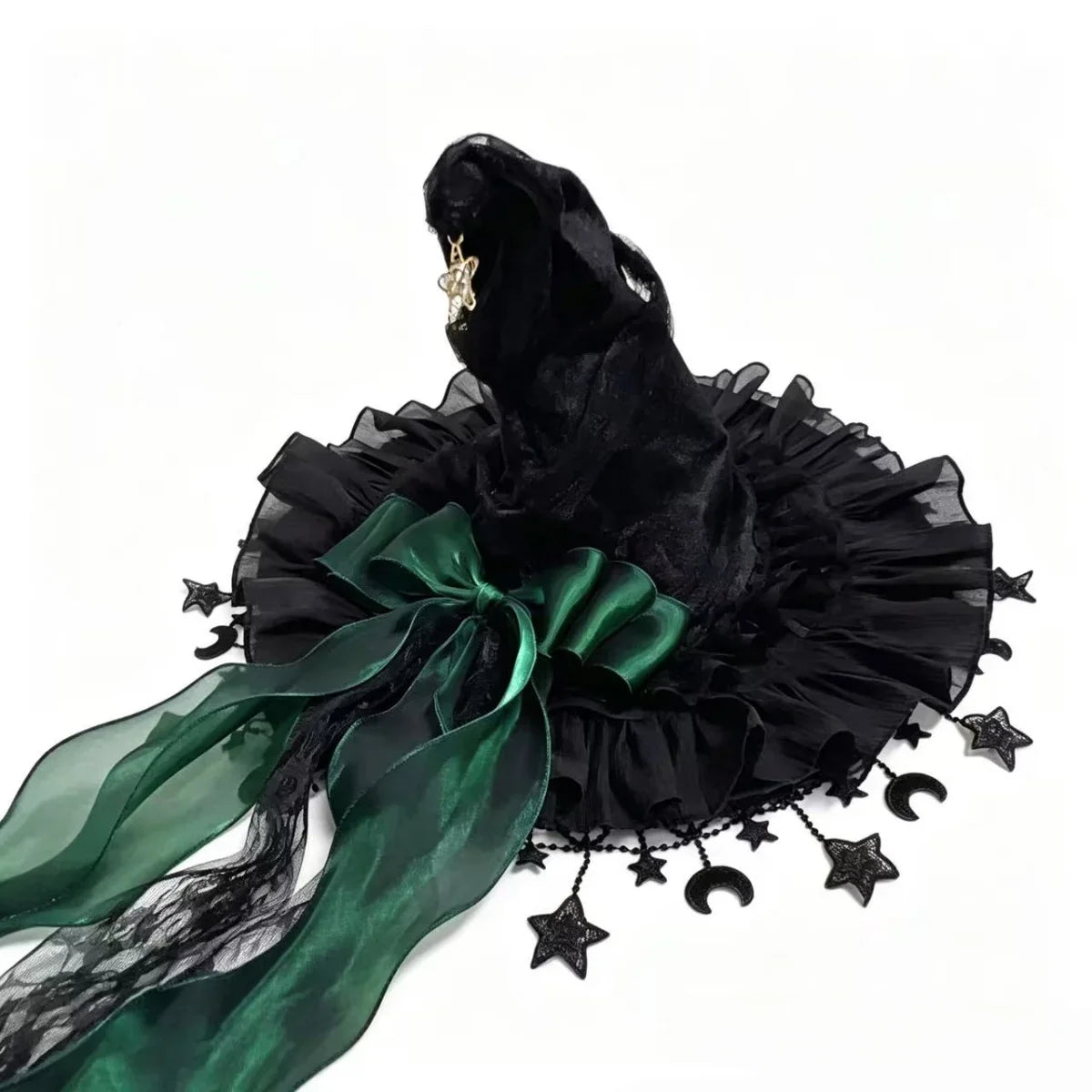 Black lace witch hat with green bow and star fringe, flat lay front view