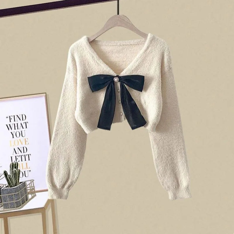Red velvet dress with white bow sweater, plush velvet texture