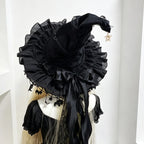 Black lace witch hat with black bow back view on model
