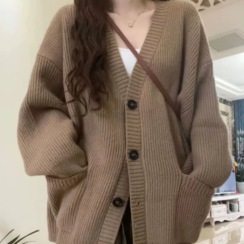 Mocha Cardigan Tube Top and Wide Leg Jeans Set, close-up of the mocha knit cardigan with black buttons worn by a model