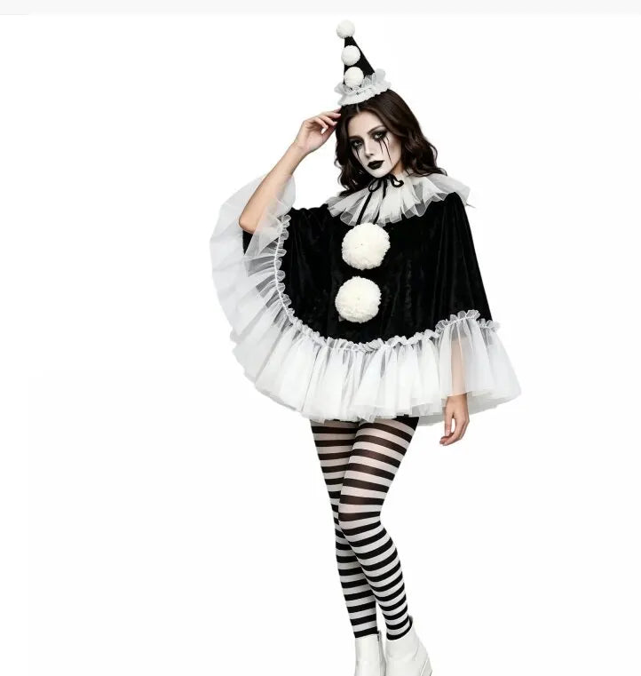 Model in black pierrot clown poncho with hat and striped tights, standing front view