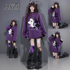Model in purple Y2K ghost knit sweater with ghost, bat and star print, three poses