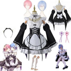 Black and white maid dress with white apron and ruffled collar, close up