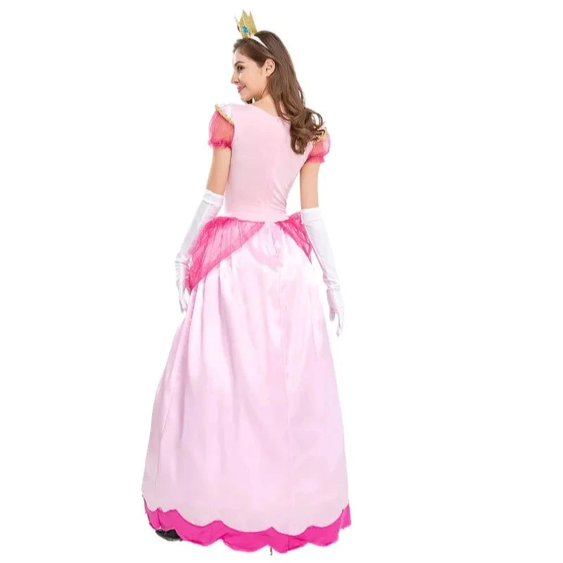 Princess Peach costume with crown and white gloves, model wearing
