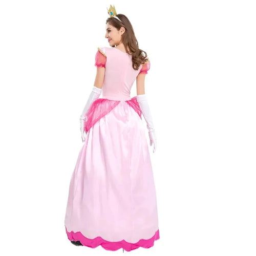 Princess Peach costume with crown and white gloves, model wearing
