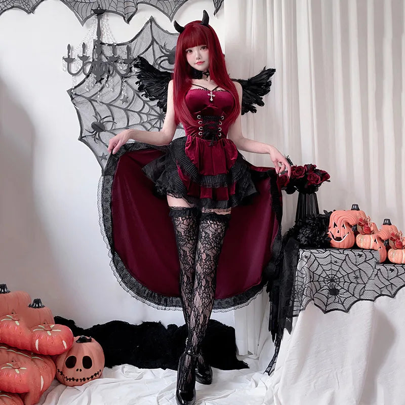 Burgundy gothic vampire dress with lace stockings and spread cape, front view