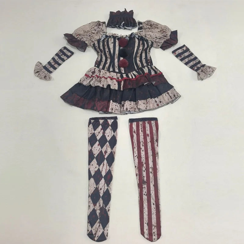 Bloody clown jester costume set flat lay: striped dress, arm sleeves, stockings, collar