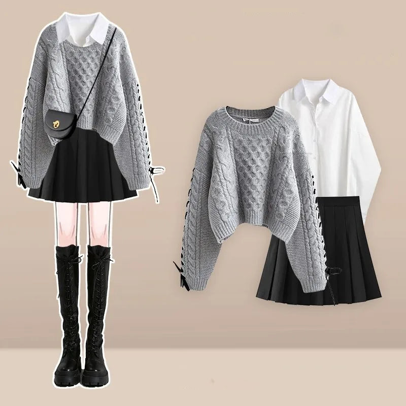 Beige cable knit sweater with white shirt and pleated skirt, pleated mini skirt