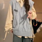 Blue Striped Knit Vest Shirt and Jeans Set, model wearing light blue cable-knit vest over cream shirt, close-up