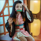 Nezuko Kamado Demon Slayer kimono with bamboo muzzle on model, front view