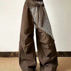 Brown Bohemian Tassel Knit Set, wide-leg brown pants with white lace panel and tie sash