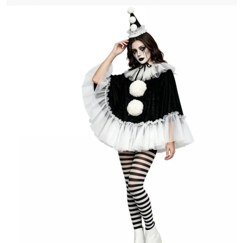 Model wearing black pierrot clown poncho with pointed pom pom hat and striped tights