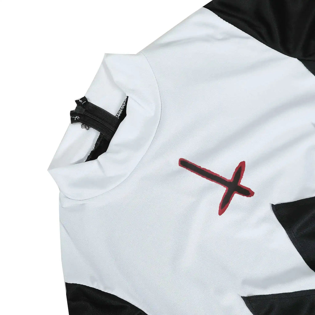 Close-up detail of white nun collar with red cross print and zipper