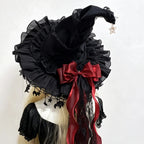 Black lace witch hat with red bow back view on model