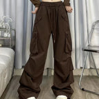 Brown Knit Vest Striped Shirt and Cargo Pants Set, model wearing brown cargo pants with drawstring waist