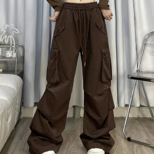 Brown Knit Vest Striped Shirt and Cargo Pants Set, model wearing brown cargo pants with drawstring waist