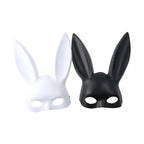 White and black matte bunny ear masks side by side, straight front view