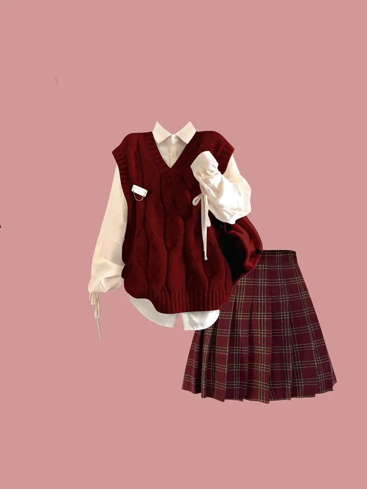 Burgundy cable knit vest with white shirt and plaid skirt, cable knit pattern