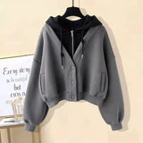 
seulement un sweat à capuche gris