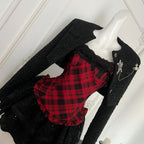 Red plaid corset skirt set with tweed jacket on mannequin, angled front view