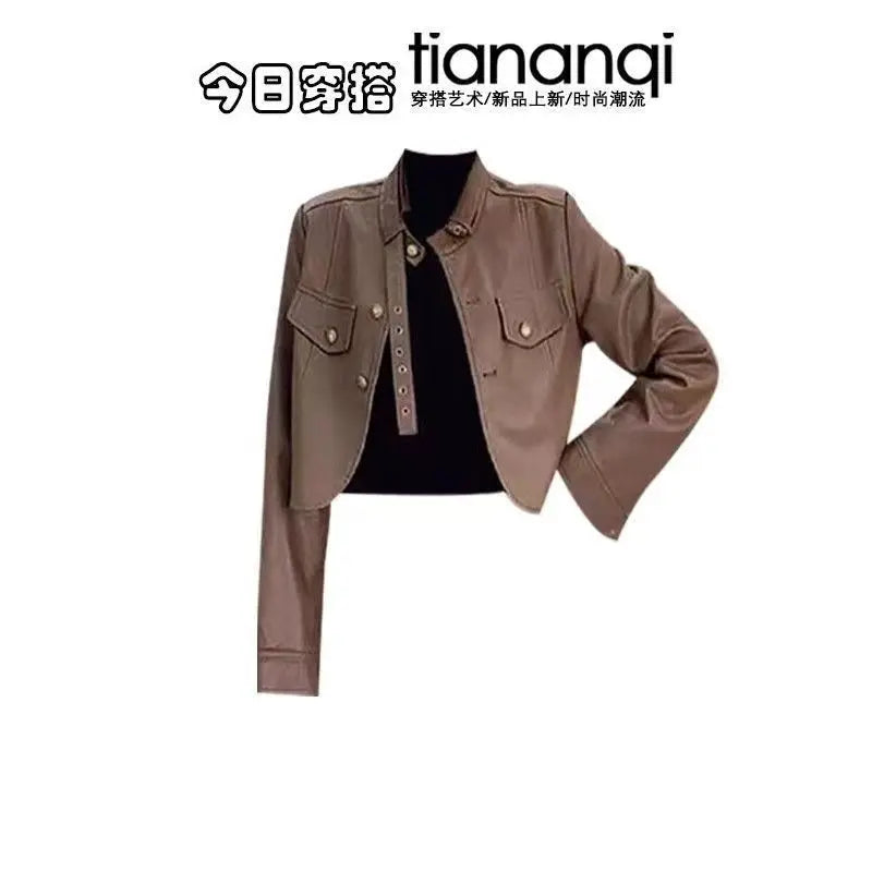Brown Leather Jacket and White Ruffle Dress Set, detail view of the brown cropped leather jacket on a white background