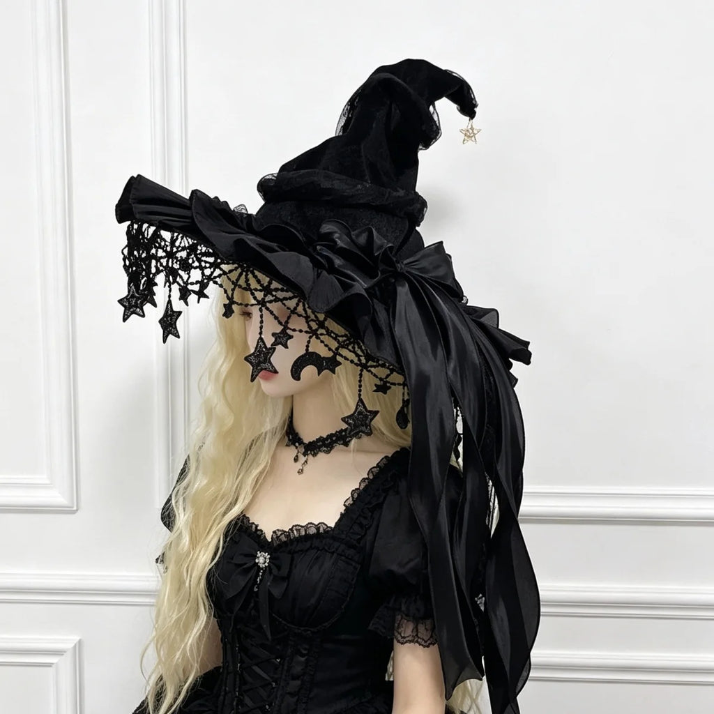 Black lace witch hat with black bow on model, side view