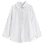 Cream cable knit cardigan with shirt tie and pleated skirt, open front cardigan
