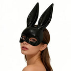 Model wearing black glossy bunny ear mask, three quarter view