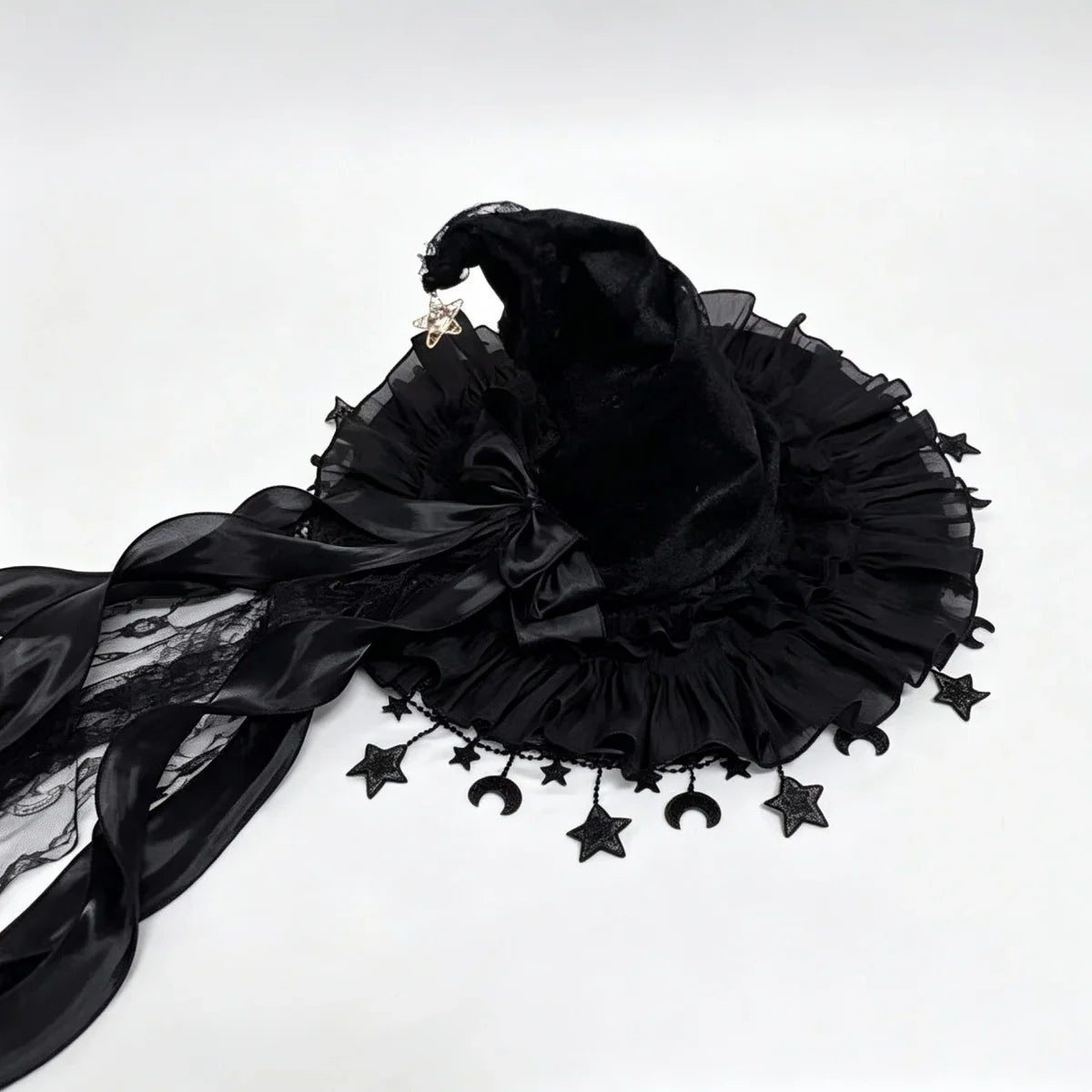 Black lace witch hat with black bow, flat lay front view