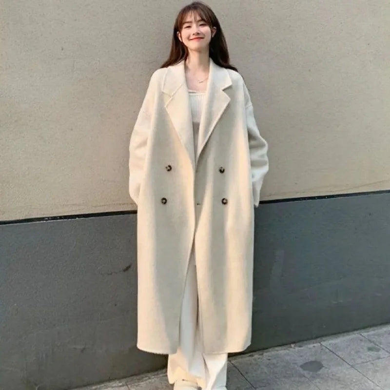 Cream Wool Coat Sweater and Wide Leg Jeans Set, model wearing the long cream double-breasted wool coat
