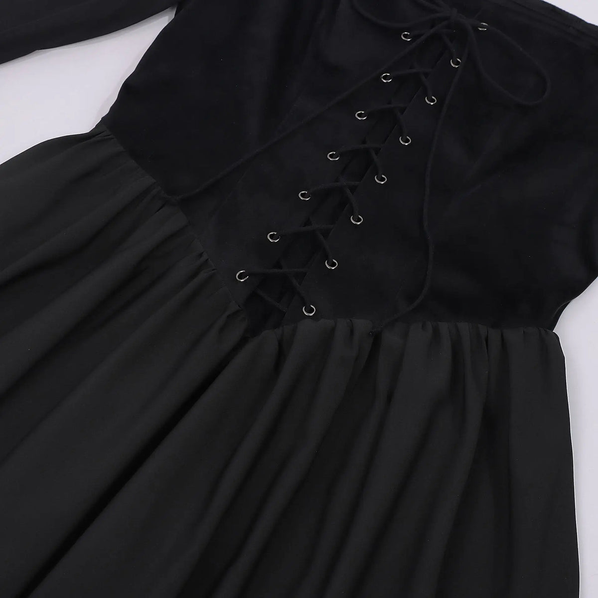 Close up of lace up corset front and sheer bell sleeve on black witch Halloween dress