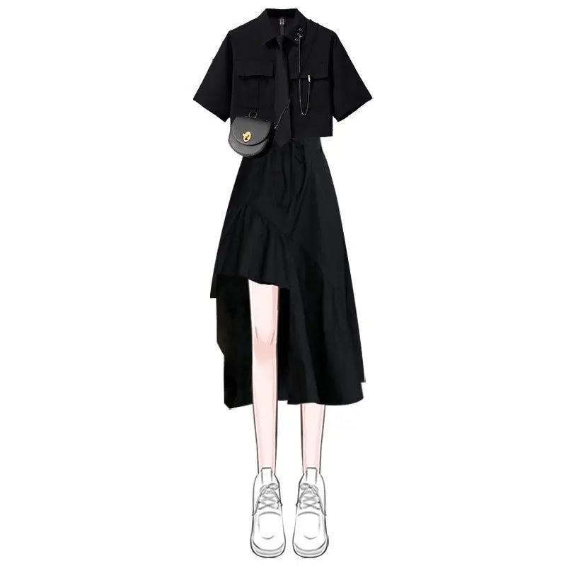 Black two piece punk dress outfit with short sleeve top and asymmetrical skirt paired with white sneakers