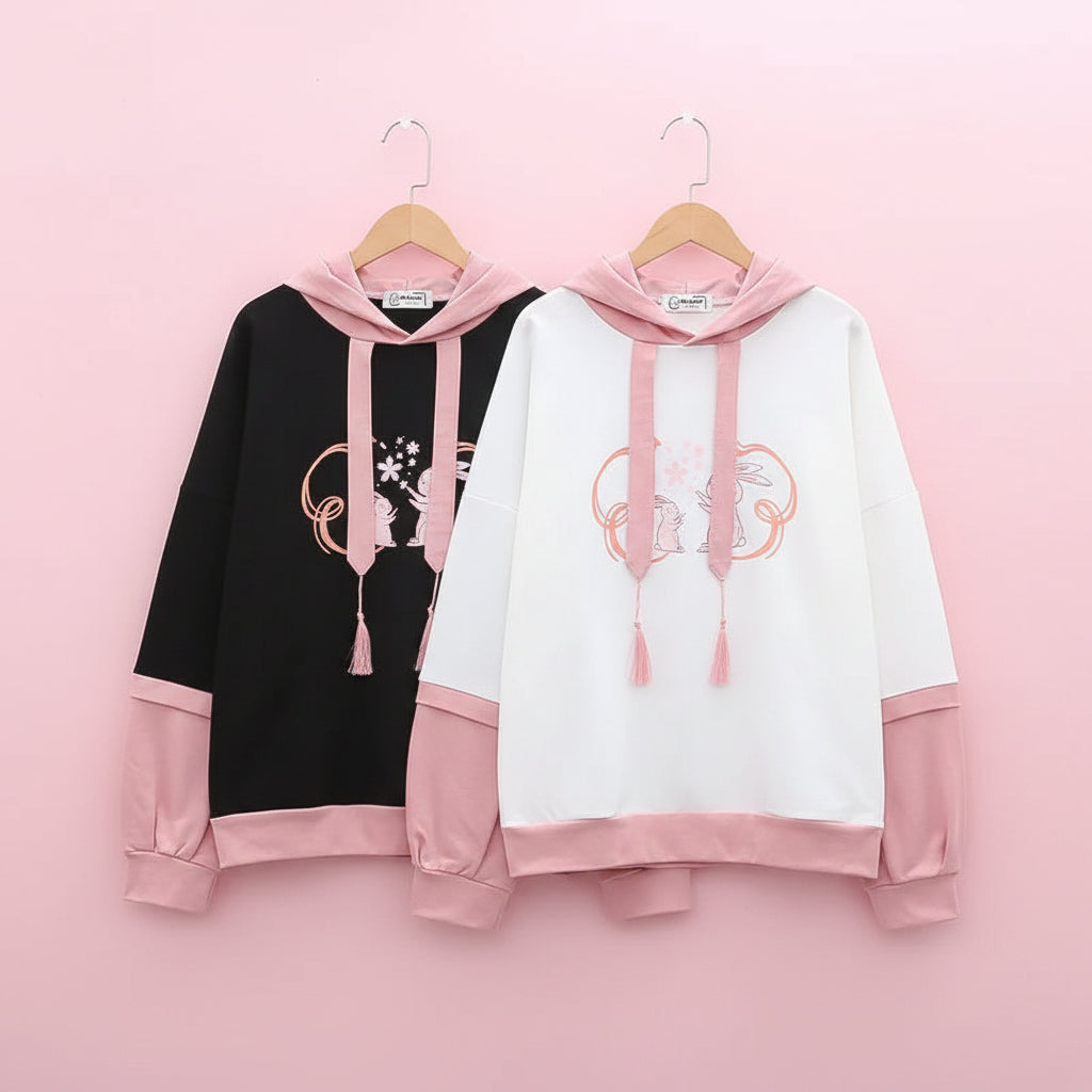Casual Japanese cute hoodie with cartoon print in white and black with pink hood and cuffs from Vusy Kawai Shop