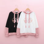 Casual Japanese cute hoodie with cartoon print in white and black with pink hood and cuffs from Vusy Kawai Shop