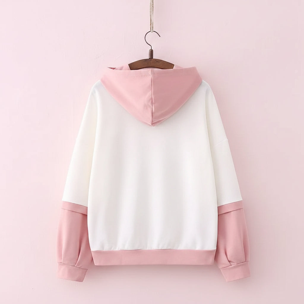 Back view of casual japanese cute hoodie with cartoon print featuring white and pink color block design