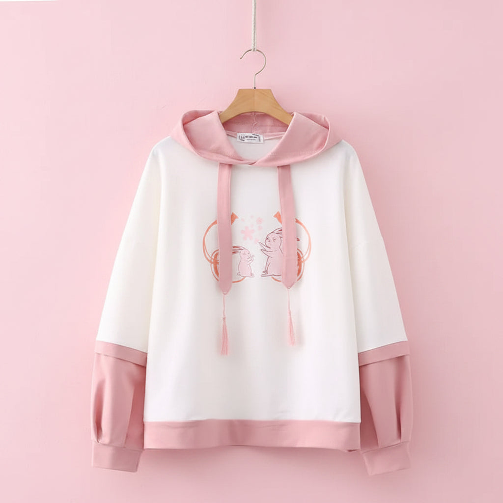 Casual Japanese cute hoodie with cartoon print in white and pink featuring adorable animal design