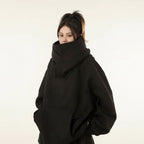 Black oversized casual Japanese streetwear fashion hoodie with high neck worn by model