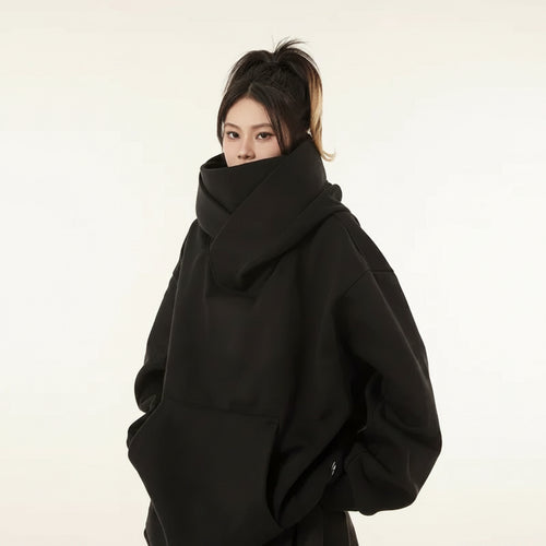Black oversized casual Japanese streetwear fashion hoodie with high neck worn by model