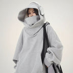 Gray oversized casual Japanese streetwear fashion hoodie with high neck and large hood worn by a model