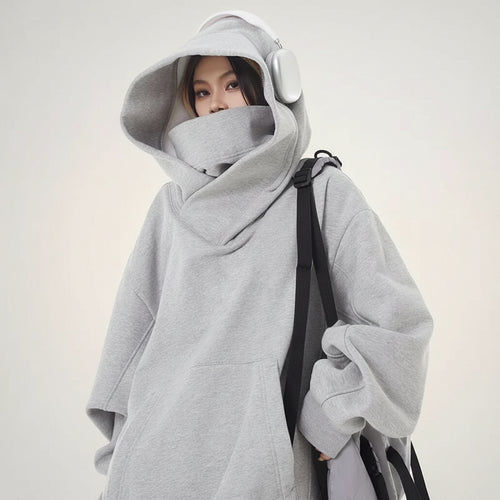 Gray oversized casual Japanese streetwear fashion hoodie with high neck and large hood worn by a model