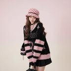 College style black sweater for women with pink striped sleeves and number 27 design