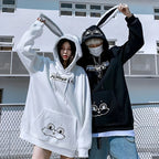 Cute animal couple hoodie for teens in white and black with bunny ears and playful face design