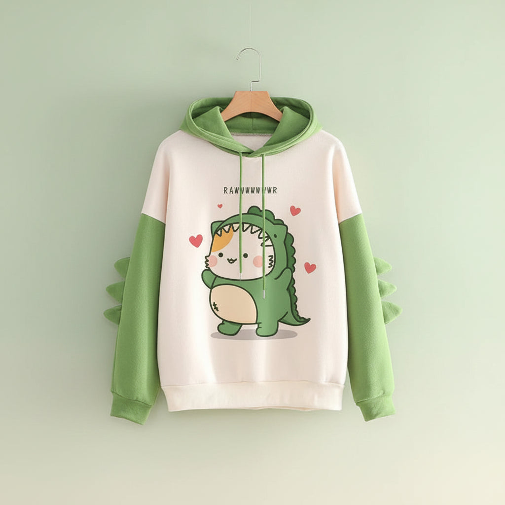 Cute cartoon dinosaur sweatshirt unisex with green hood and sleeves featuring dinosaur spikes and heart accents