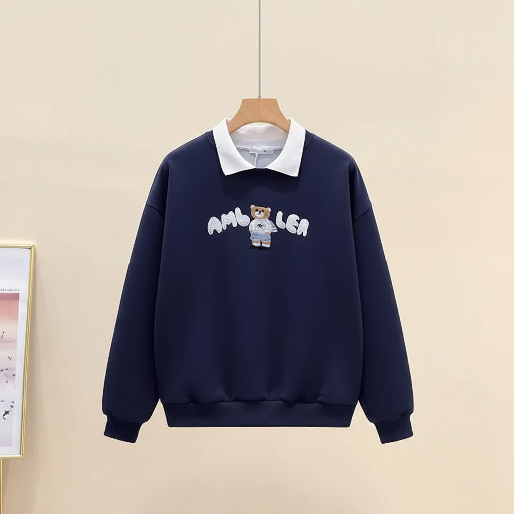 Cute embroidered long sleeve preppy top in navy with white collar and teddy bear design